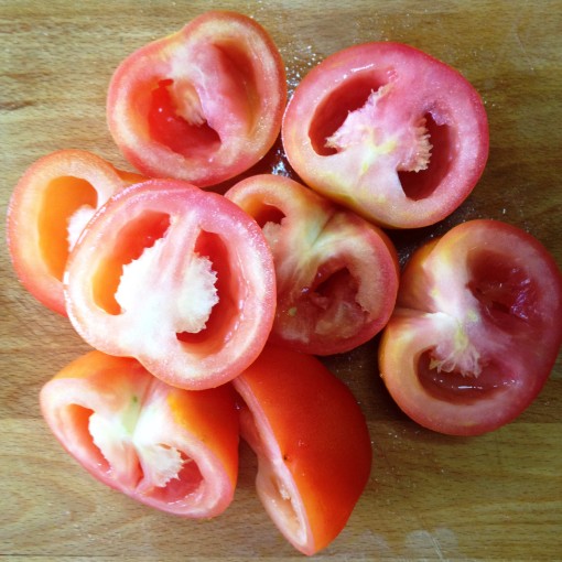 Four medium–sized tomatoes, already seeded, ready to be blanched, peeled and then finely chopped.