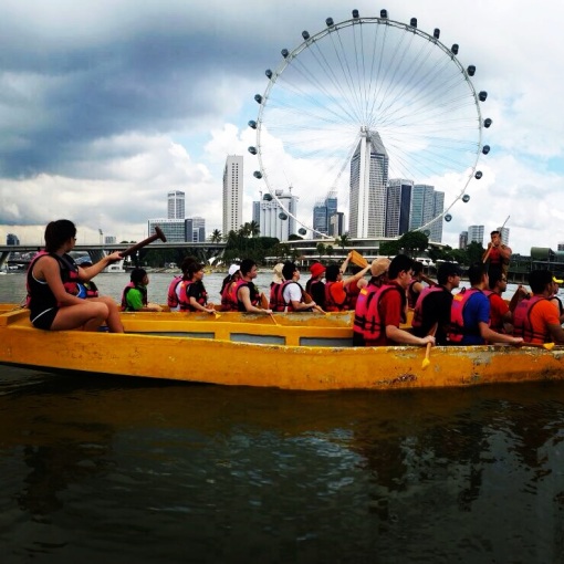 My fellow first-time paddlers against the backdrop of the awesome Singapore skyline at daylight, anchored on to the image of the Singapore Flyer.  This is my favorite from all the photos taken.